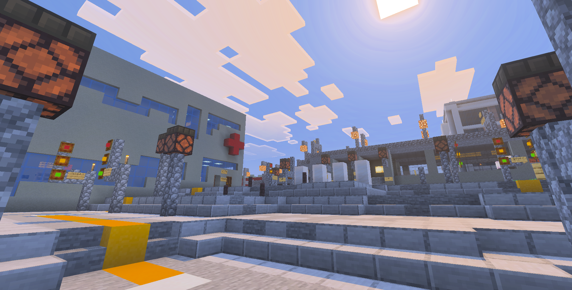 Downtown Mine Falls with multiple buildings: the Visiting Center, the MFS-NEW hospital, and the train station from 3rd Ave. S.